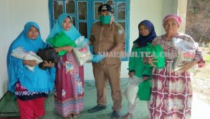 Kades Puulemo Salurkan Bantuan Sembako dari Pemda Konut