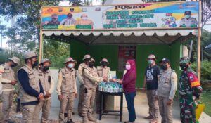 Satgas Covid -19 Desa Panggulawu Bagikan 2000 Masker